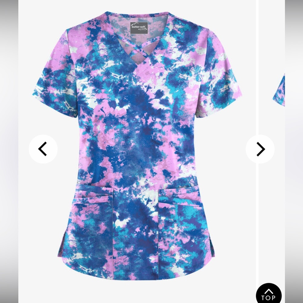 Scrub top size 2X. Soft stretch material in good condition.